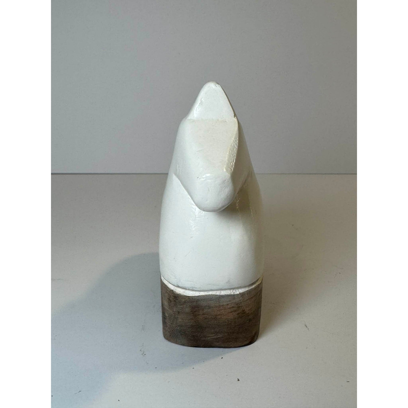 White wooden horse with natural wood color wood legs